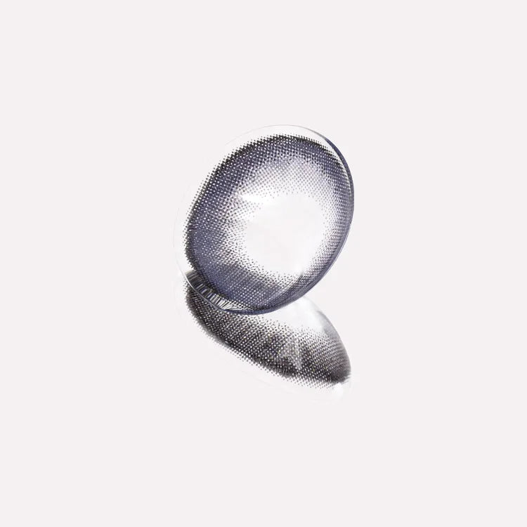 Close-up of a contact lens on a white background